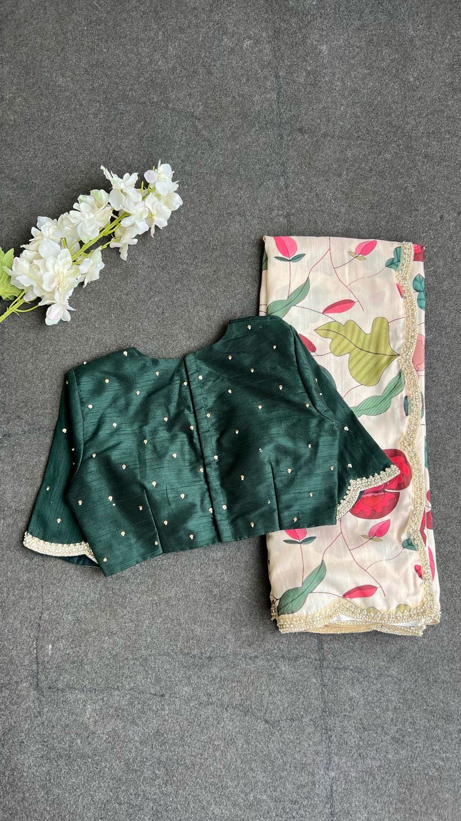 Half white floral kossa saree with green hand worked blouse