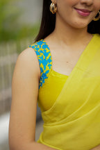 Multi georgette saree with yellow hand made blouse