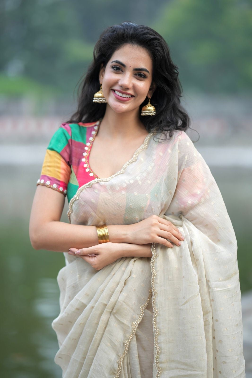 Beige georgette tissue saree with multi hand work blouse