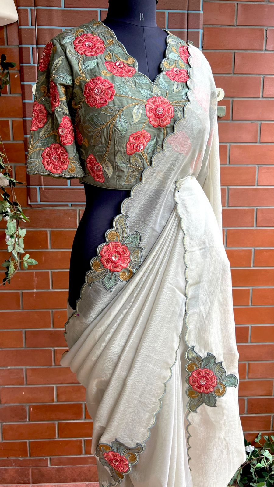 Half white textured organza saree with heavy handwork blouse