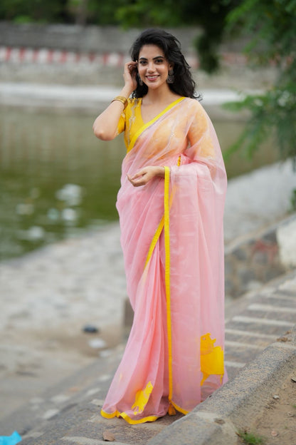 Peach organza saree with yellow hand work blouse