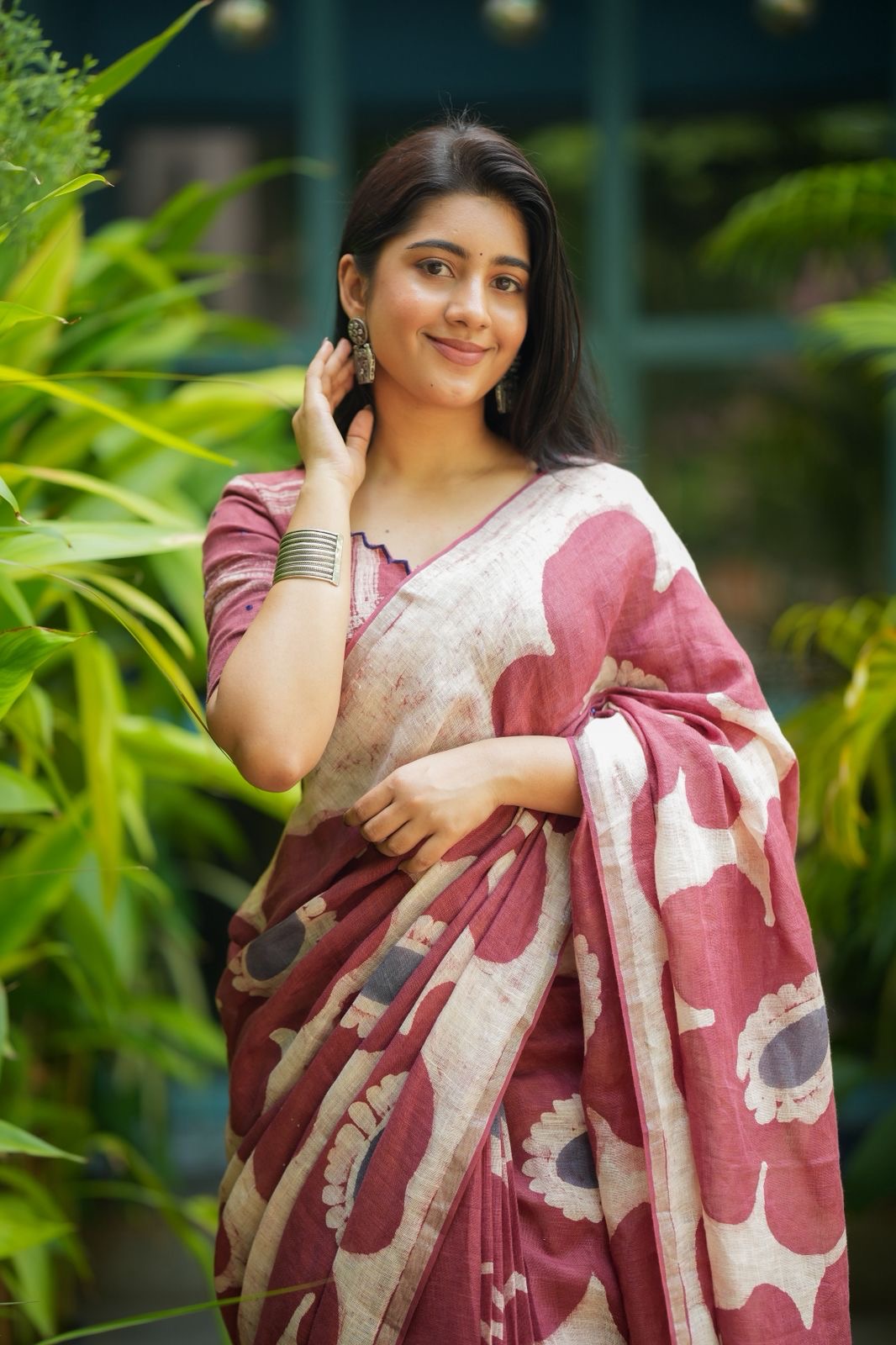 Brown linen floral saree with hand work blouse