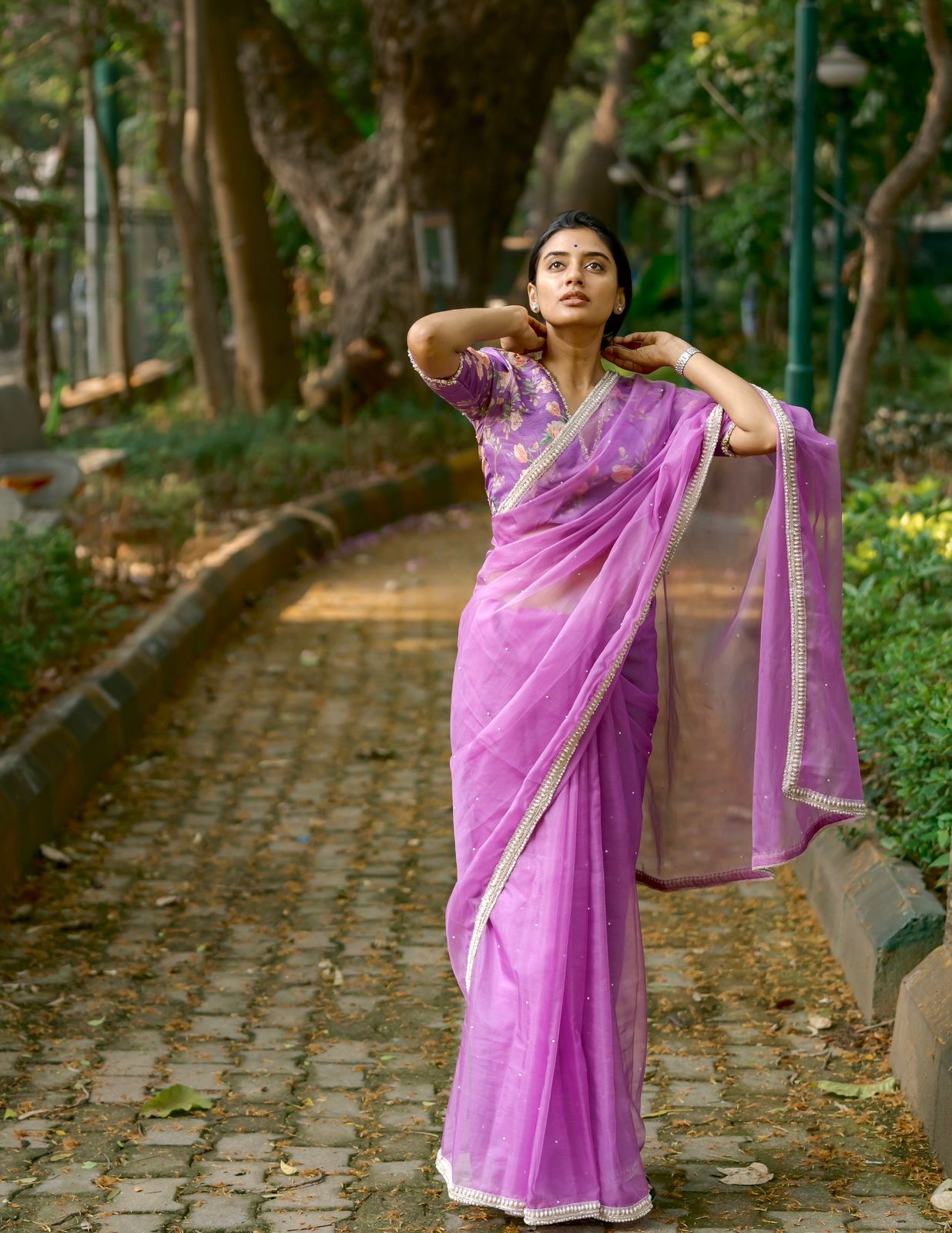 Lavender organza saree with pearl hand work blouse