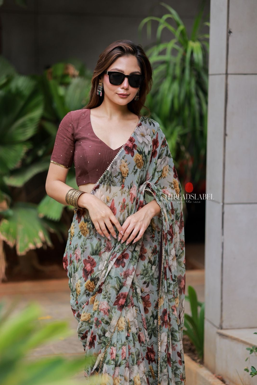 Sage green floral chiffon saree with hand work blouse