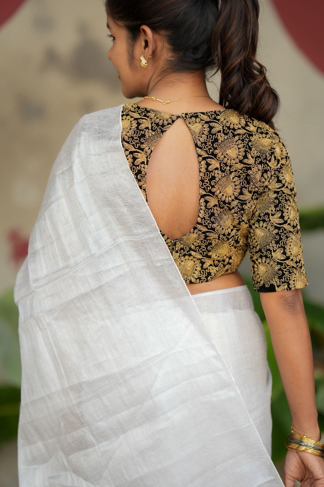 White soft tissue saree with heavy embroidery blouse