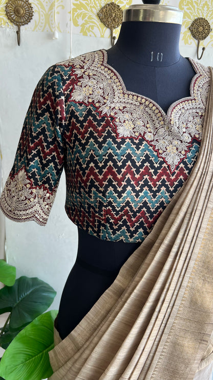Golden cream tissue saree with ajrak embroidery blouse