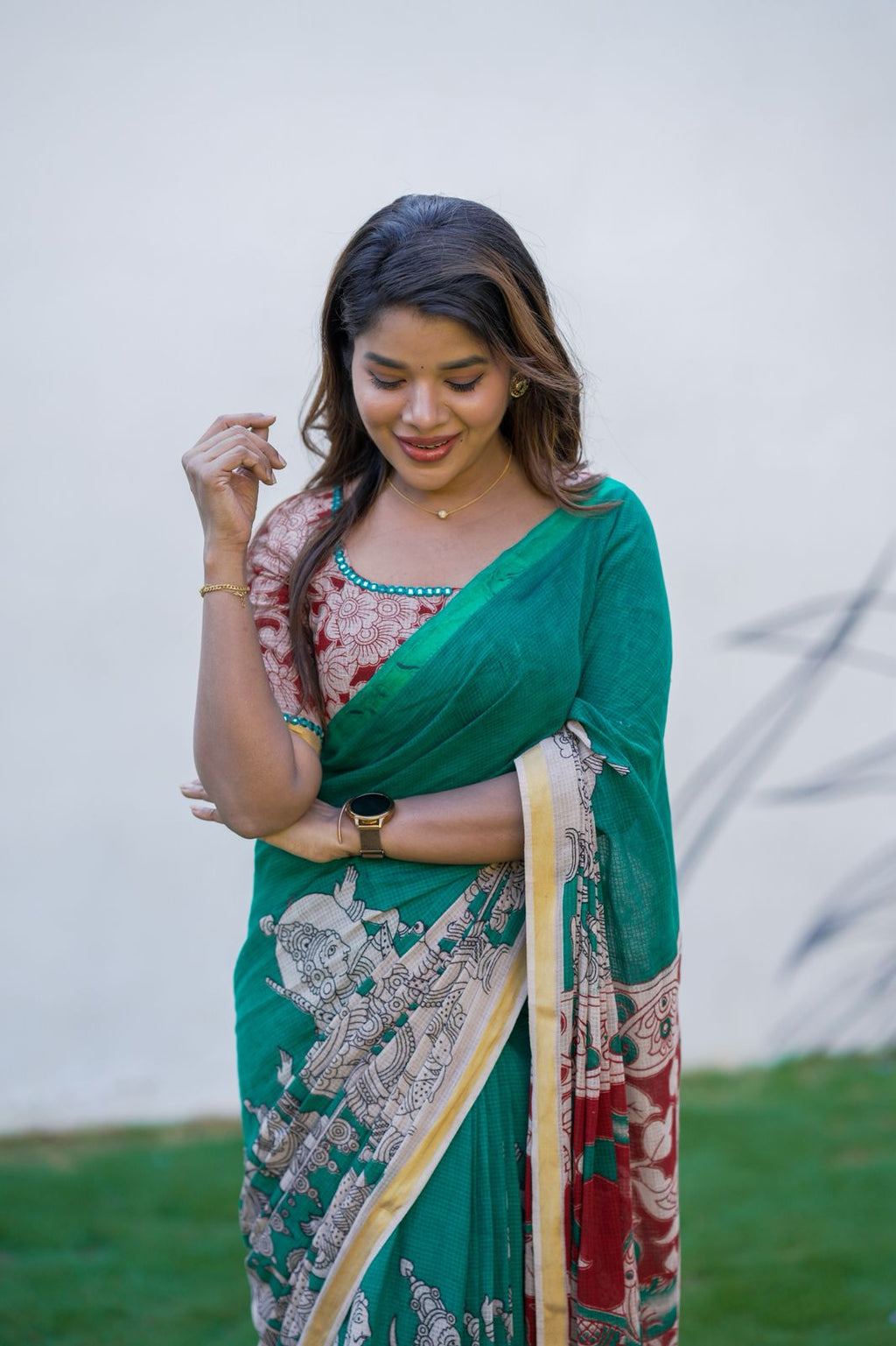 Green kota saree with kalamkari work blouse