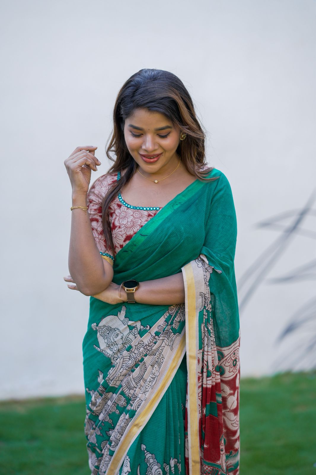 Green kota saree with kalamkari work blouse