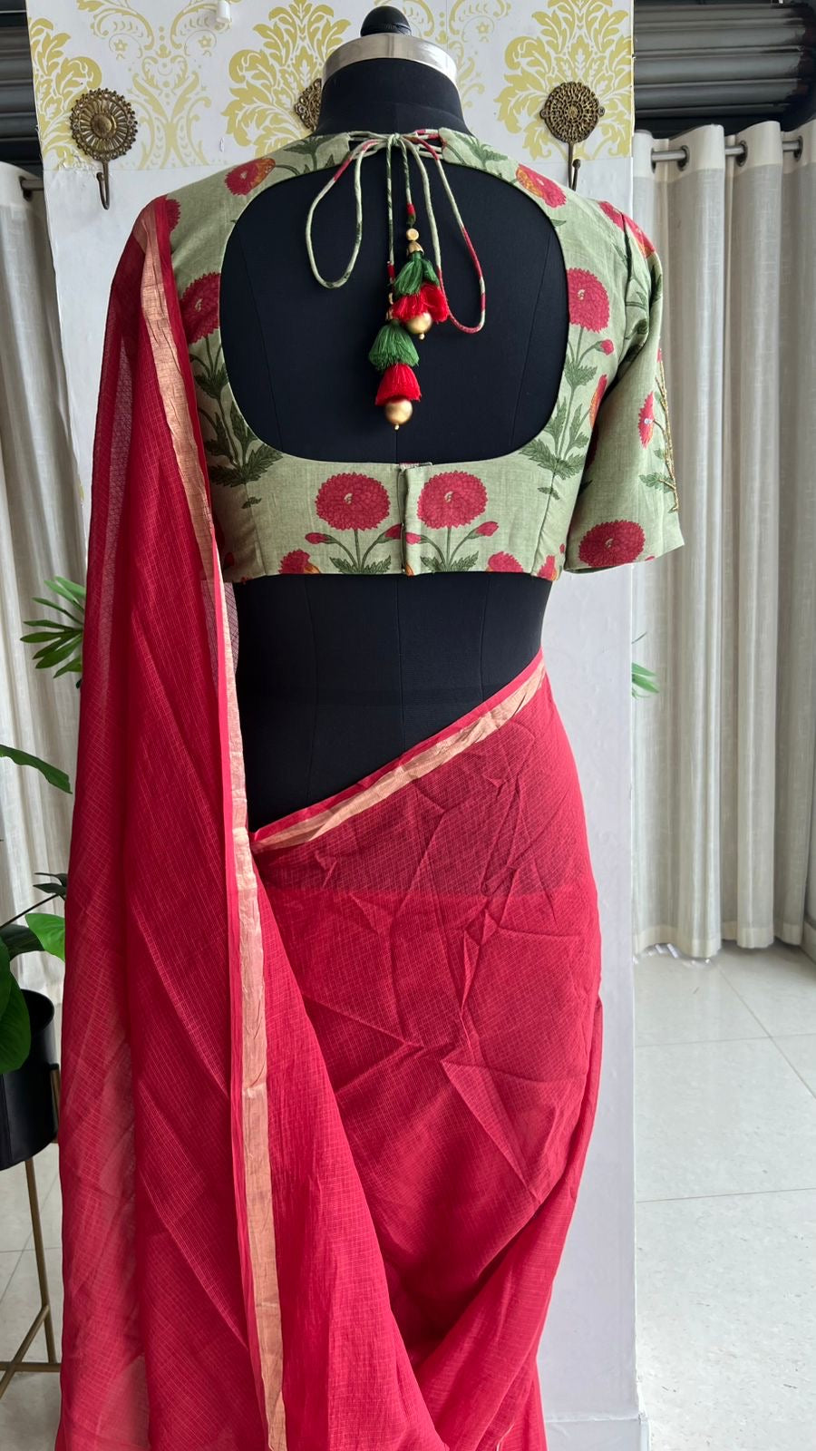 Maroon pure kota saree with green hand work blouse