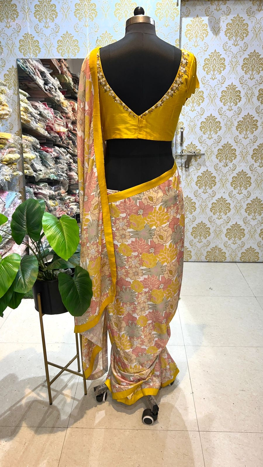 Yellow viscose floral saree with hand worked blouse