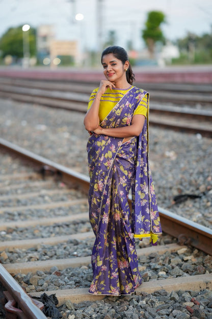 Blue floral tissue saree with lime hand work blouse