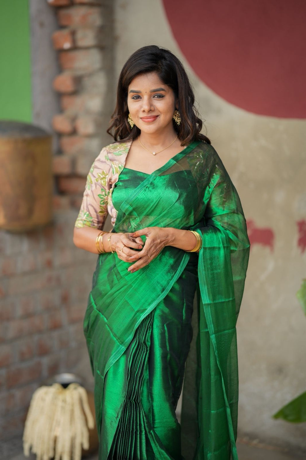 Green soft tissue saree with embroidered blouse