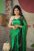 Green soft tissue saree with embroidered blouse