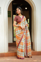 Multi checked kota saree with brown embroidery blouse