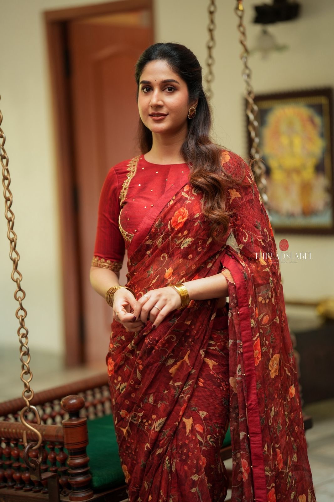 Maroon chiffon floral saree with hand work blouse