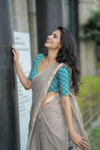 Grey pure kota saree with blue hand work blouse