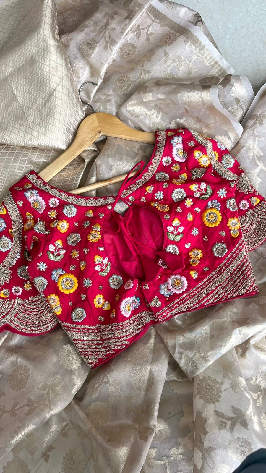 Half white banarasi saree with deep pink silk hand embroidery blouse