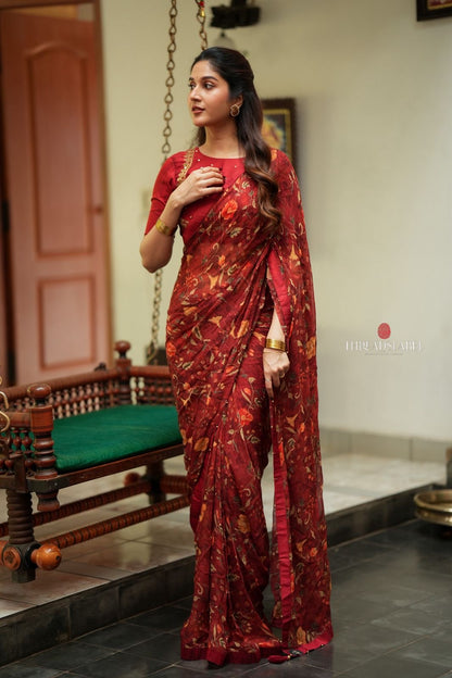 Maroon chiffon floral saree with hand work blouse