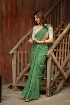 Green mul chanderi saree with halfwhite embroidery blouse