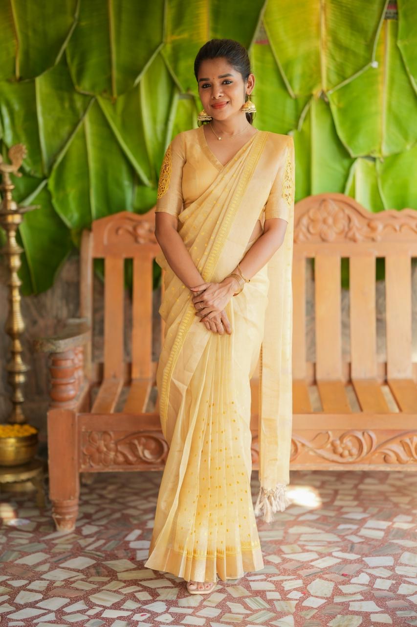 Gold kota doria saree with hand work blouse