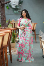 Pista floral organza saree with hand work blouse