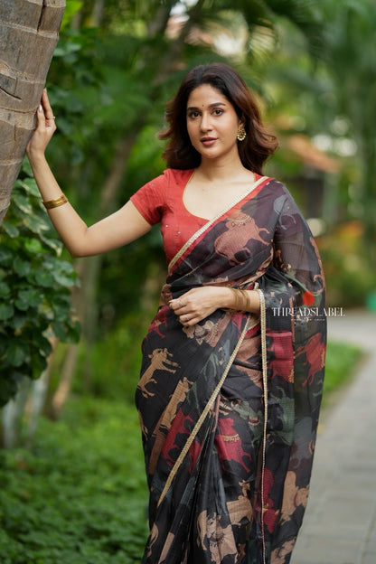 Black cow kota saree with paisley hand work blouse