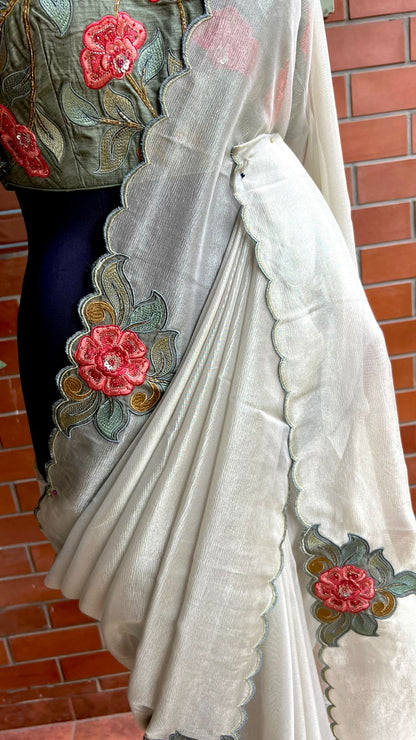 Half white textured organza saree with heavy handwork blouse