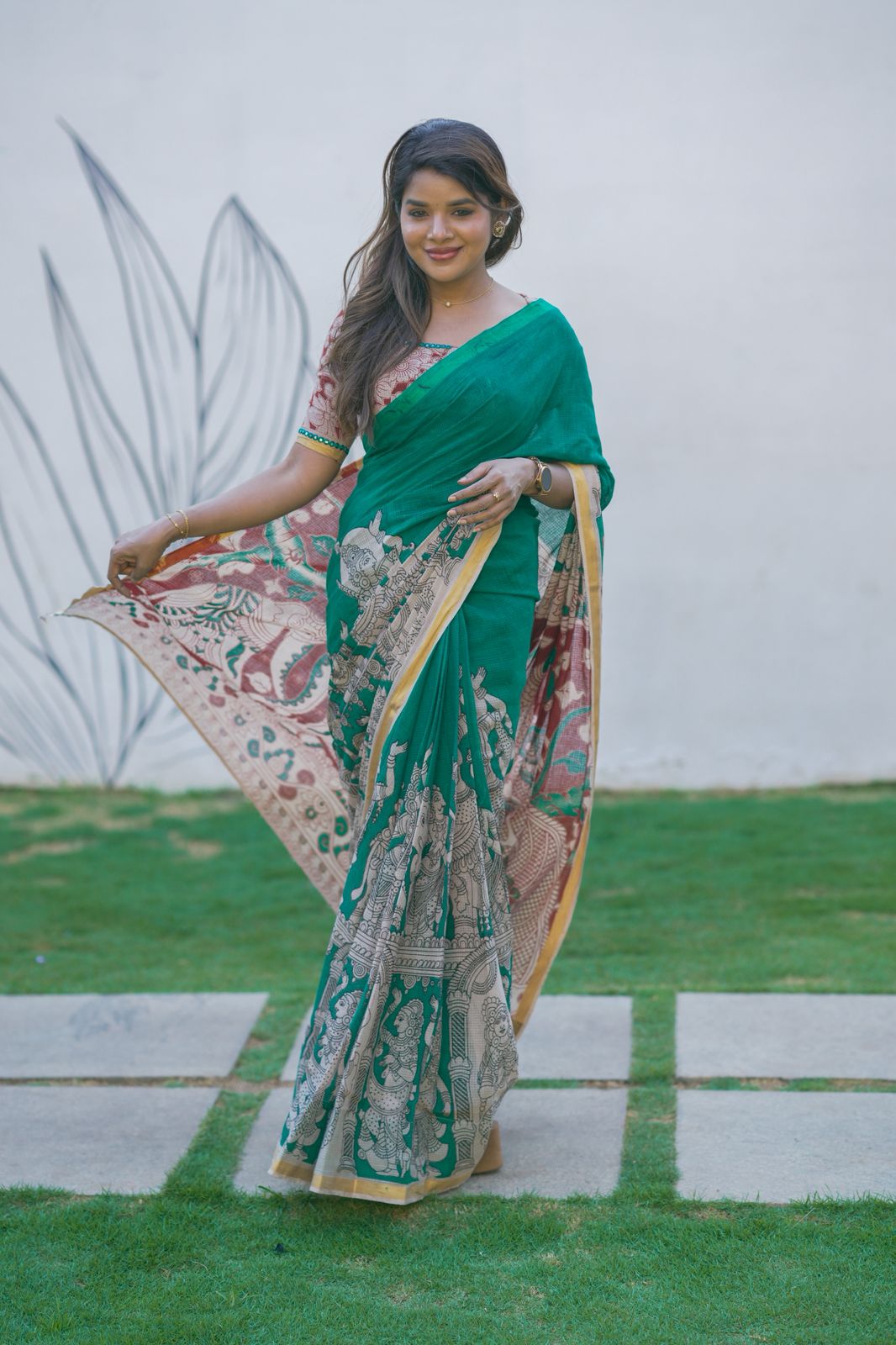 Green kota saree with kalamkari work blouse