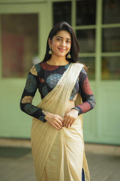 Cream malai chanderi saree with Ajrak handblock print blouse