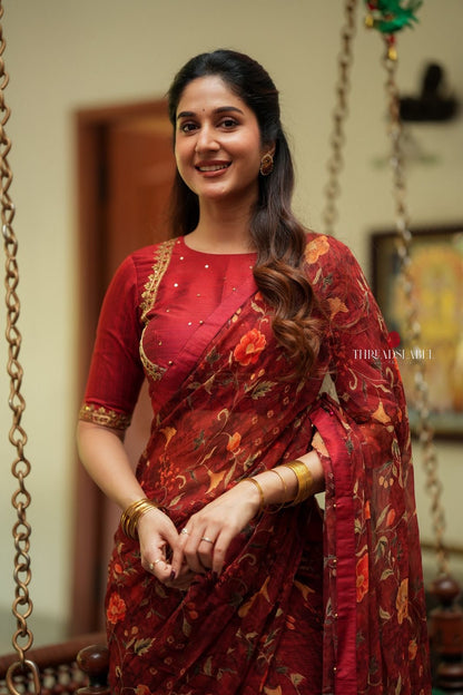 Maroon chiffon floral saree with hand work blouse