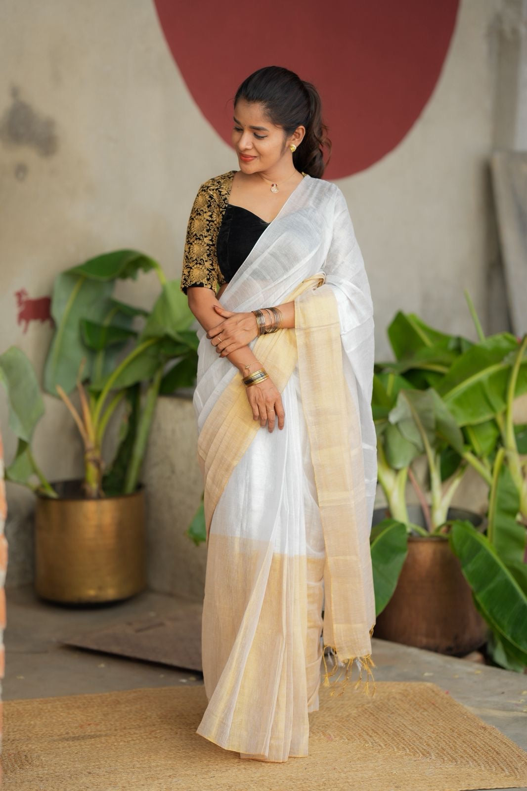 White soft tissue saree with heavy embroidery blouse