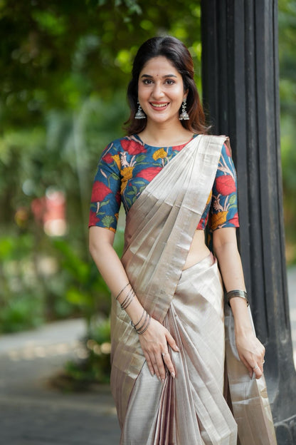Silver soft tissue saree with blue kalamakari blouse