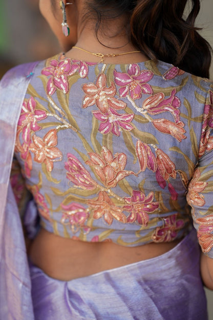 Lavender soft tissue saree with embroidered blouse