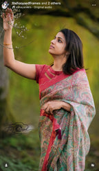 Jade green viscose jute saree with pink tissue blouse