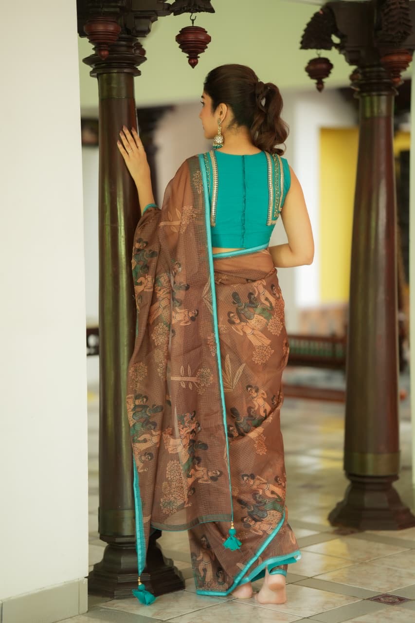 Brown kalamkari kota saree with blue hand work blouse