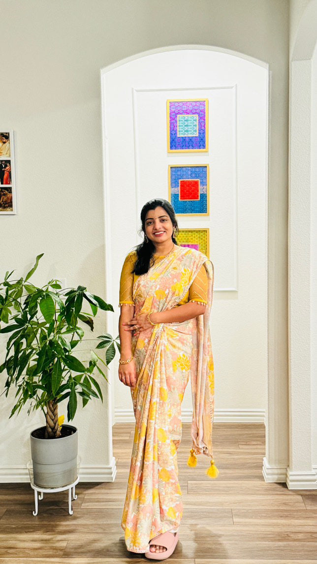 Yellow viscose floral saree with hand worked blouse