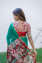 Green kota saree with kalamkari work blouse
