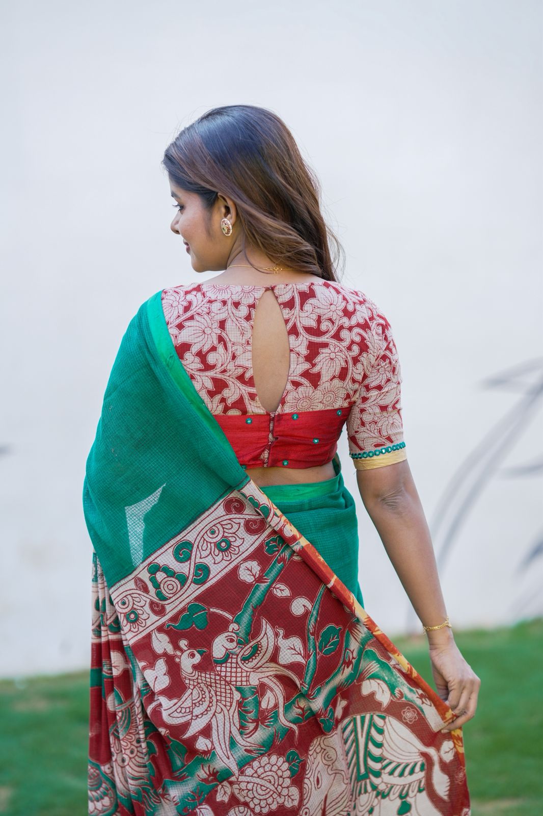 Green kota saree with kalamkari work blouse