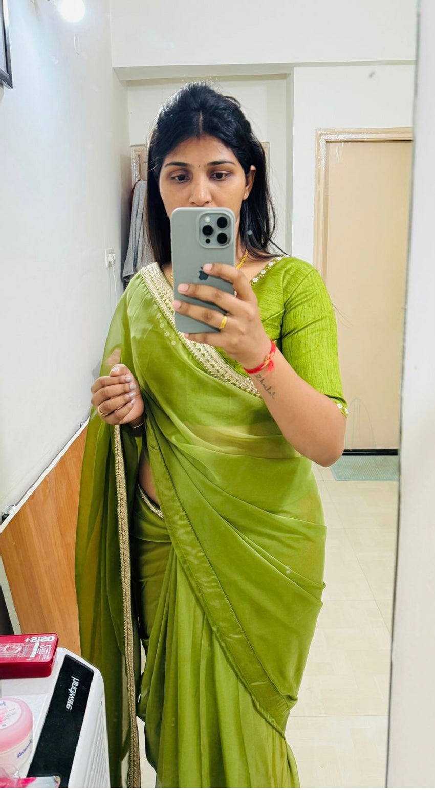 Green soft organza saree with hand worked blouse