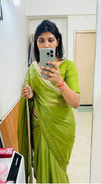 Green soft organza saree with hand worked blouse