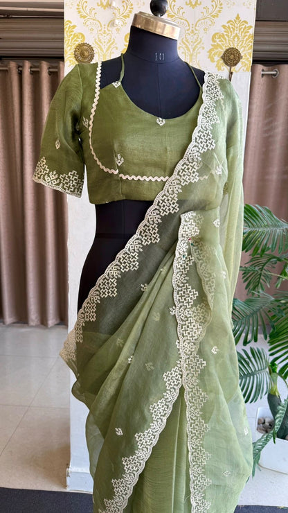 Light green tissue saree with tissue embroidery blouse