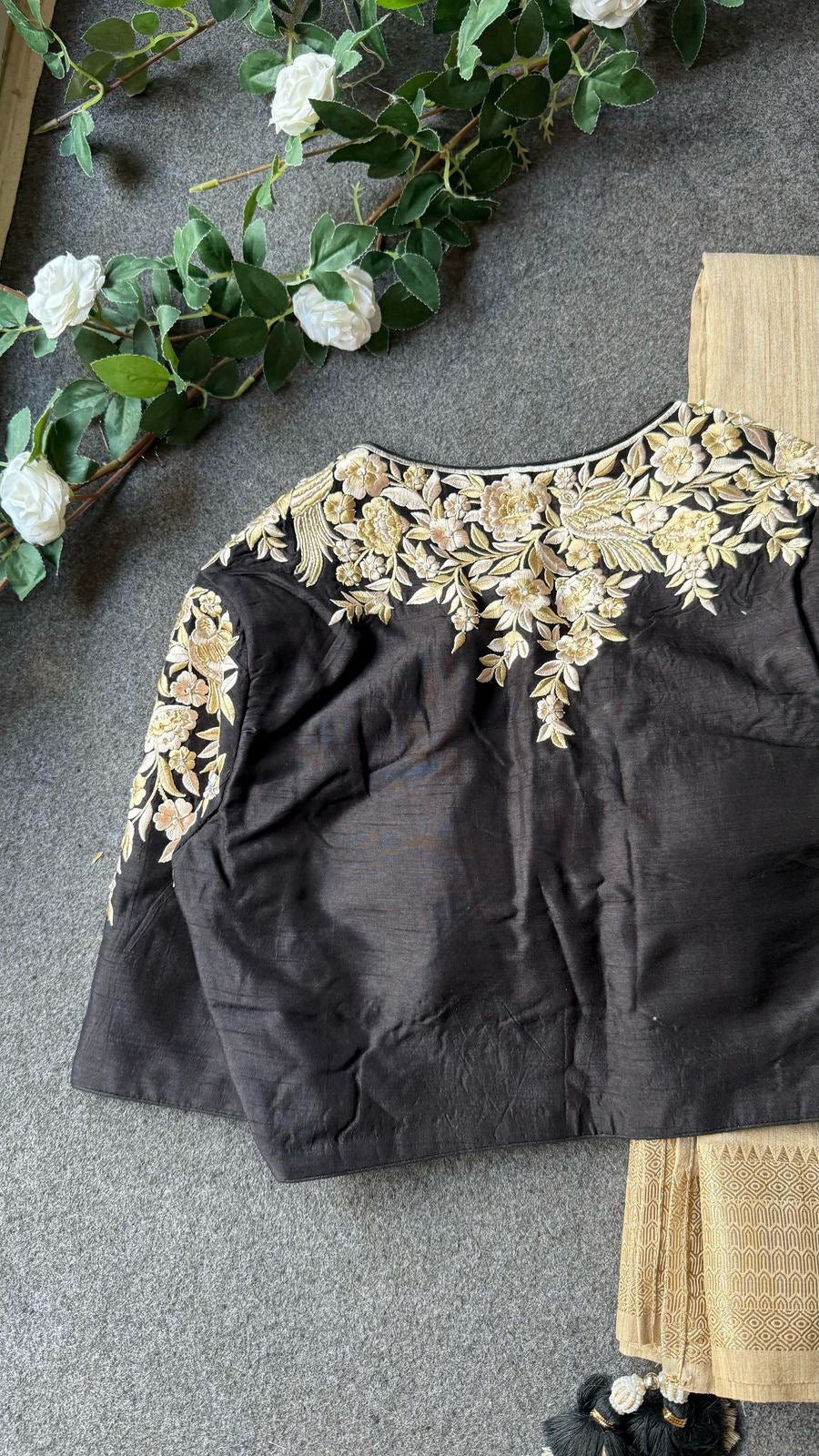Golden cream tissue saree with black hand work blouse