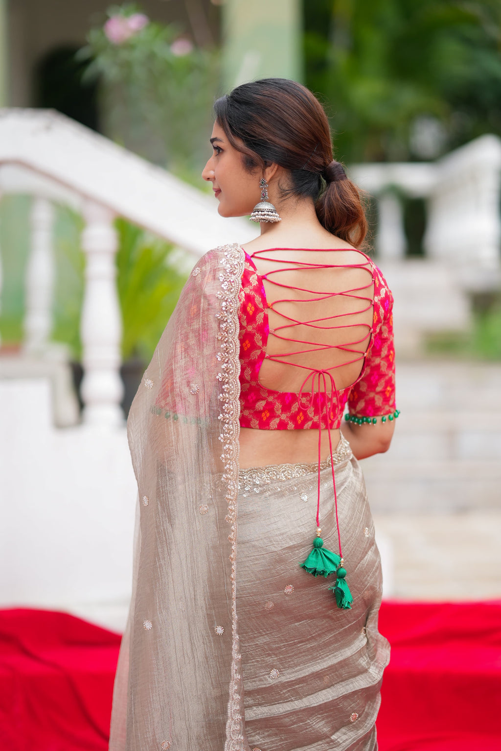 Grey tissue saree with red banarasi blouse