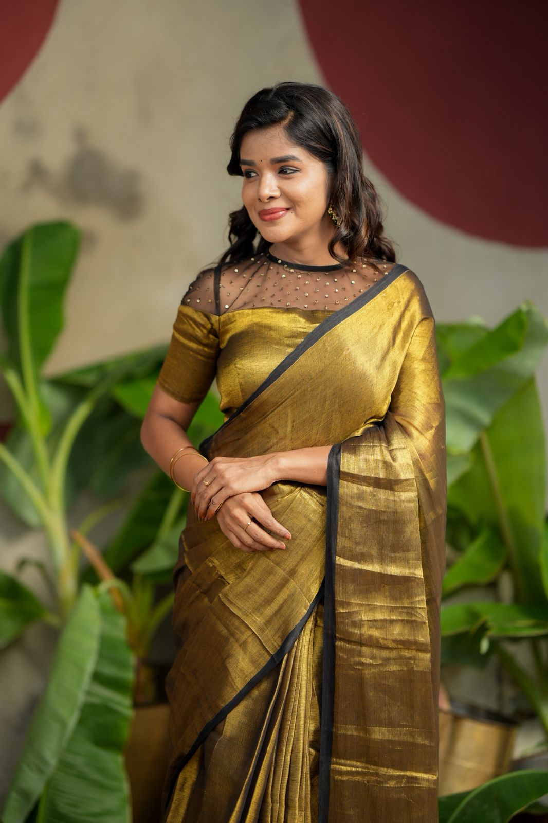 Golden soft tissue saree with hand work blouse