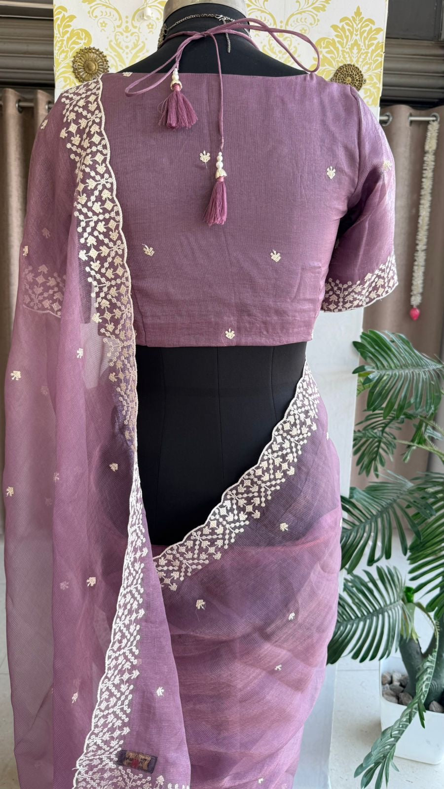 Lavender tissue saree with tissue embroidery blouse