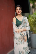 Half white chiffon floral saree with hand work blouse