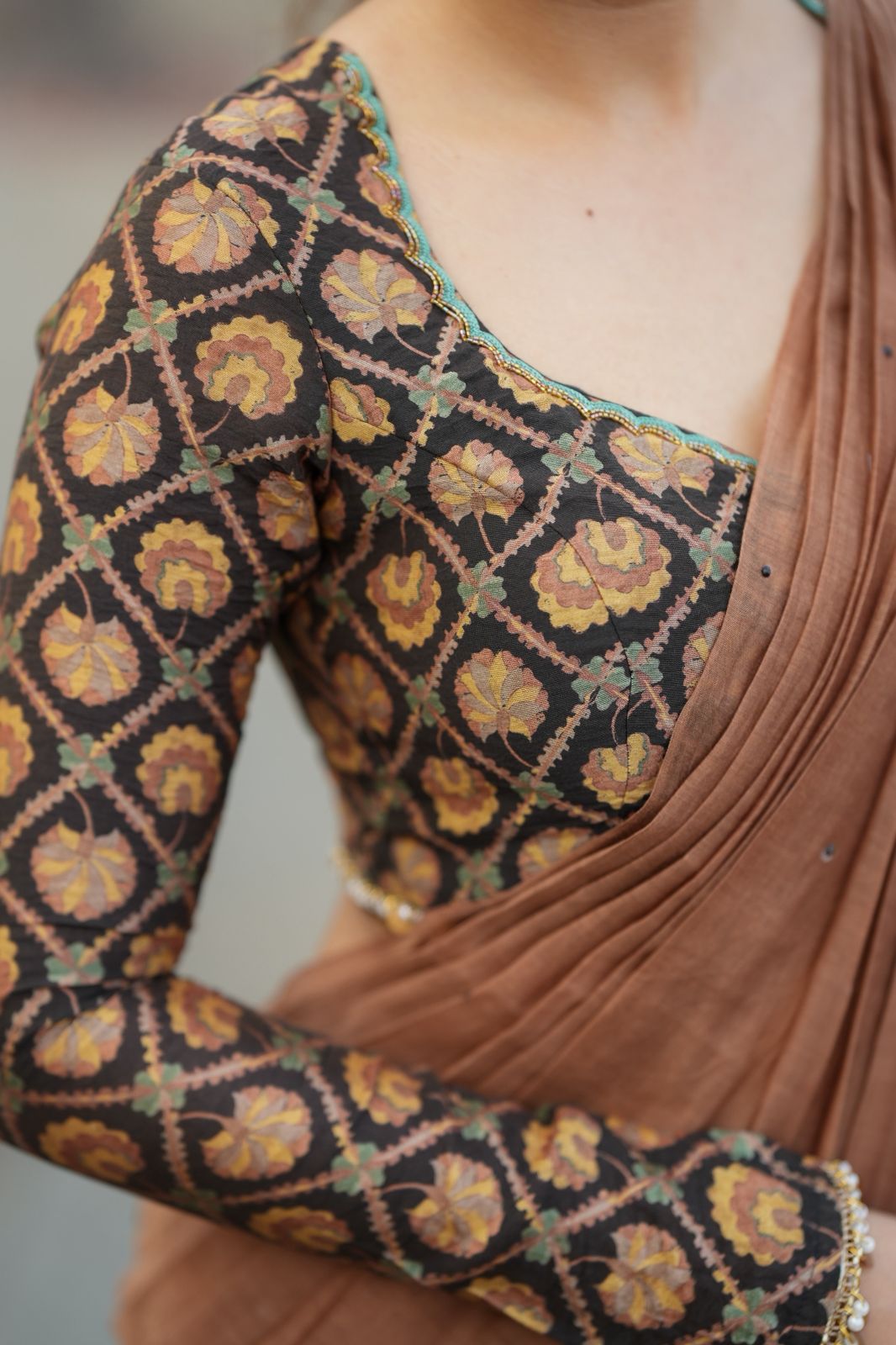 Brown malai chanderi saree with Ajrak print blouse