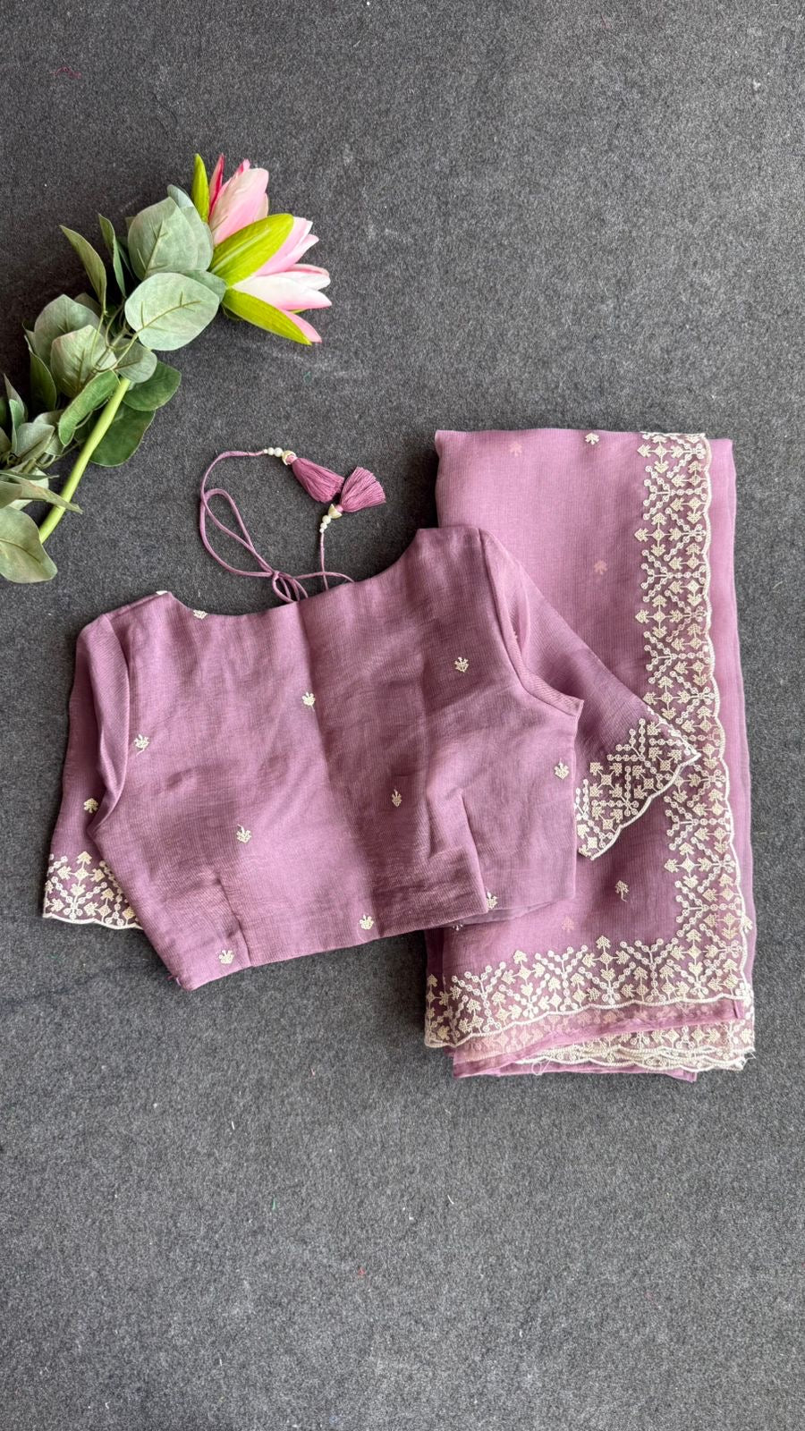 Lavender tissue saree with tissue embroidery blouse