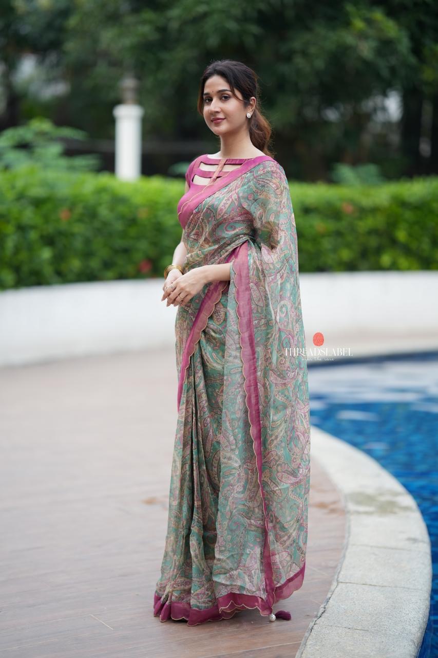Jade green viscose jute saree with pink tissue blouse