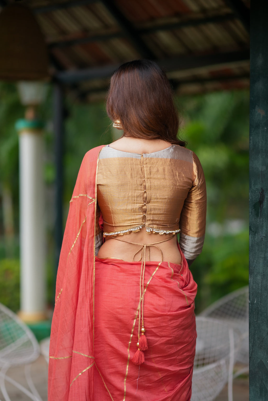 Orange rust saree with tissue handwork blouse